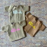 beige with pink logo